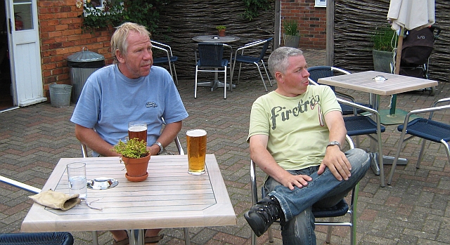 iw and sl sat at a table in the beer garden snettisham